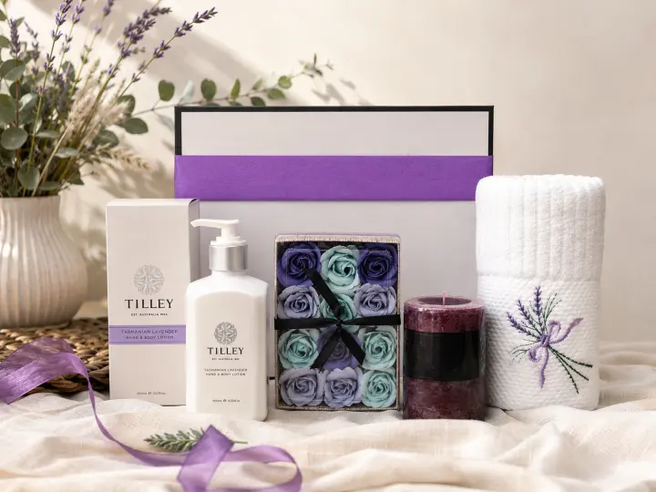 Lavender-toned pamper gifts with candles and soaps
